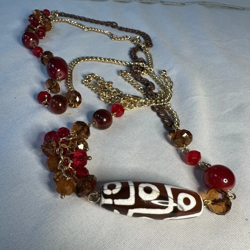 Long goldtone sparkly statement necklace